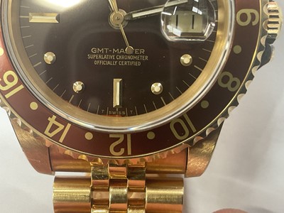 Lot 692 - Rolex GMT Master with box and papers