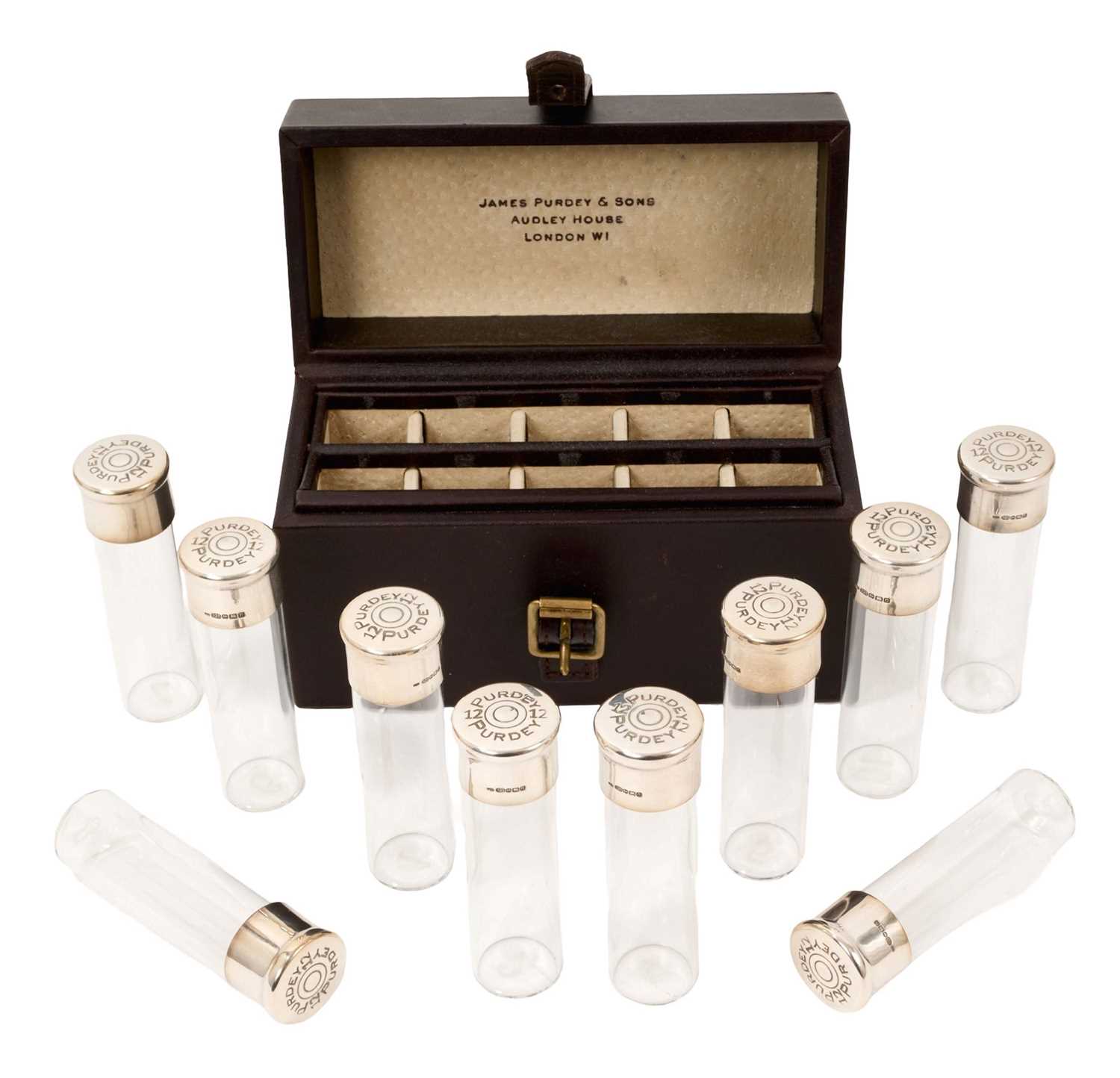 Lot 955 - James Purdy & Sons set of ten peg markers in the form of silver (925) topped 12 bore cartridges