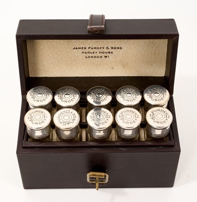 Lot 955 - James Purdy & Sons set of ten peg markers in the form of silver (925) topped 12 bore cartridges