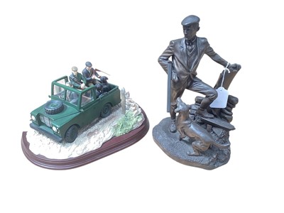Lot 949 - Two sporting themed resin figures