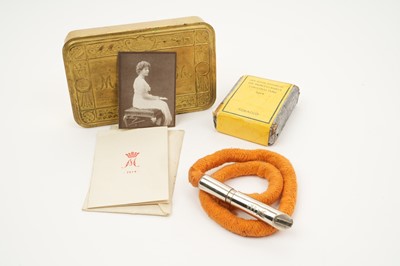 Lot 121 - First World War Princess Mary Gift tin with original contents comprising Christmas card, photograph of Princess Mary, tobacco packet and rare tinder lighter by Asprey, London.