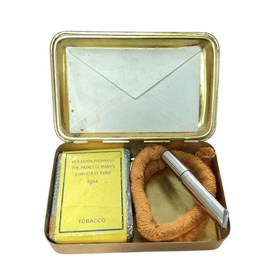 Lot 121 - First World War Princess Mary Gift tin with original contents comprising Christmas card, photograph of Princess Mary, tobacco packet and rare tinder lighter by Asprey, London.