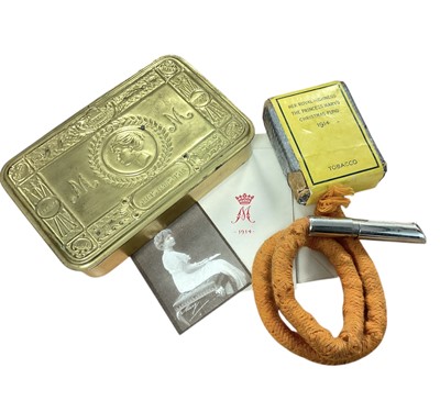 Lot 121 - First World War Princess Mary Gift tin with original contents comprising Christmas card, photograph of Princess Mary, tobacco packet and rare tinder lighter by Asprey, London.