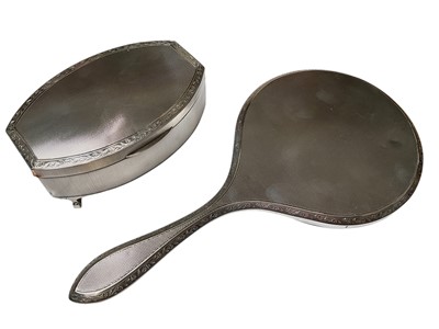Lot 21 - Mappin & Webb silver jewellery box, matching silver backed dressing table mirror and silver mounted manicure set