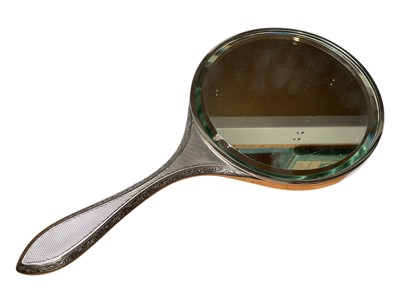 Lot 21 - Mappin & Webb silver jewellery box, matching silver backed dressing table mirror and silver mounted manicure set