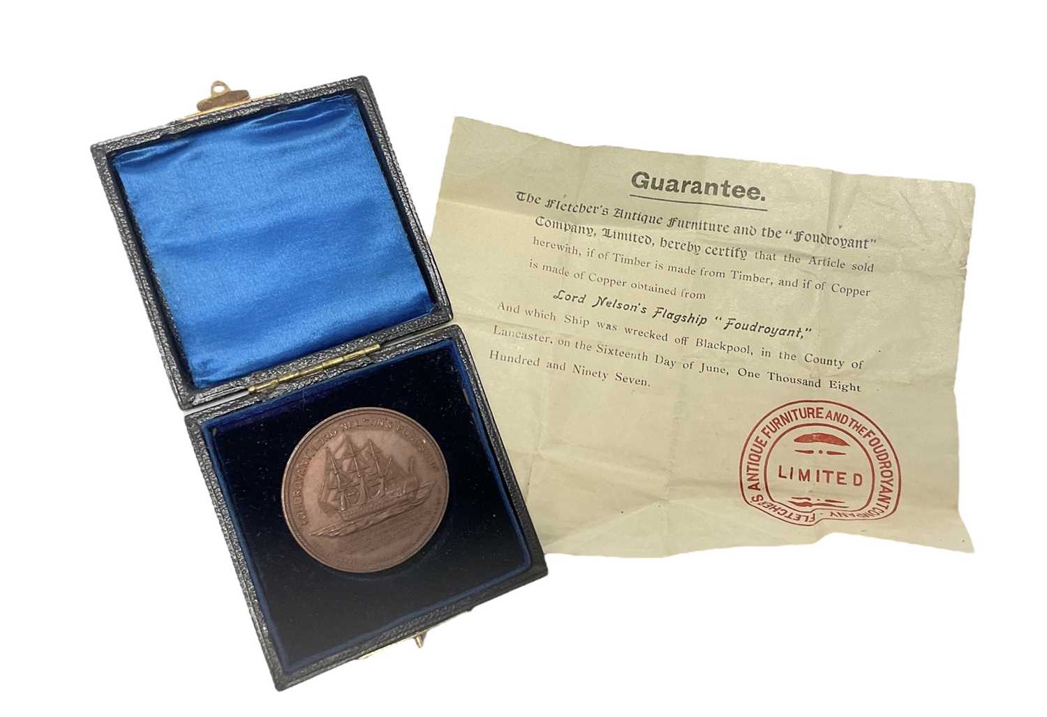 Lot 64 - Victorian bronze medal commemorating the wreck of HMS 'Foudroyant' dated 1897, obverse with portrait of Nelson, reverse with wreck of Foudroyant, 38mm in diameter, in velvet lined fitted case wi...