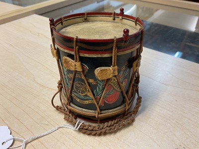 Lot 123 - Good quality early 20th century miniature Royal Artillery regimental drum with hand painted regimental badge and flags,7.9cm in overall height.