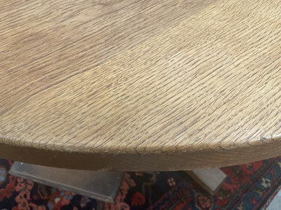 Lot 1513 - Robert 'Mouseman' Thompson oak breakfast table, with circular adzed top on quatreform pedestal base, 107cm diameter x 74cm high