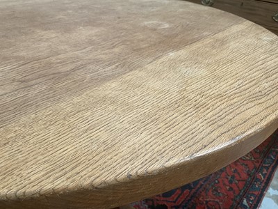 Lot 1513 - Robert 'Mouseman' Thompson oak breakfast table, with circular adzed top on quatreform pedestal base, 107cm diameter x 74cm high