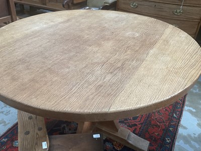 Lot 1513 - Robert 'Mouseman' Thompson oak breakfast table, with circular adzed top on quatreform pedestal base, 107cm diameter x 74cm high