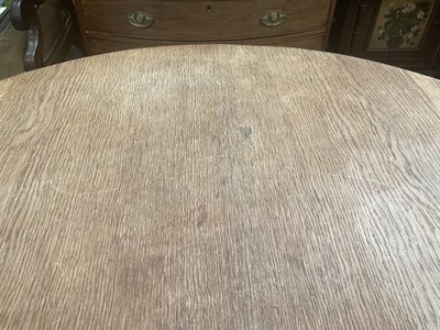 Lot 1513 - Robert 'Mouseman' Thompson oak breakfast table, with circular adzed top on quatreform pedestal base, 107cm diameter x 74cm high