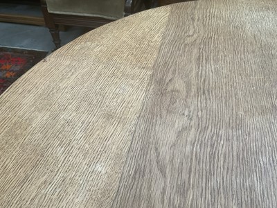 Lot 1513 - Robert 'Mouseman' Thompson oak breakfast table, with circular adzed top on quatreform pedestal base, 107cm diameter x 74cm high