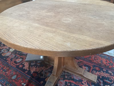 Lot 1513 - Robert 'Mouseman' Thompson oak breakfast table, with circular adzed top on quatreform pedestal base, 107cm diameter x 74cm high