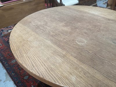 Lot 1513 - Robert 'Mouseman' Thompson oak breakfast table, with circular adzed top on quatreform pedestal base, 107cm diameter x 74cm high