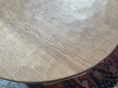 Lot 1513 - Robert 'Mouseman' Thompson oak breakfast table, with circular adzed top on quatreform pedestal base, 107cm diameter x 74cm high