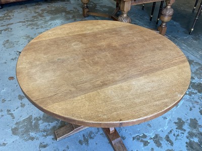 Lot 1513 - Robert 'Mouseman' Thompson oak breakfast table, with circular adzed top on quatreform pedestal base, 107cm diameter x 74cm high