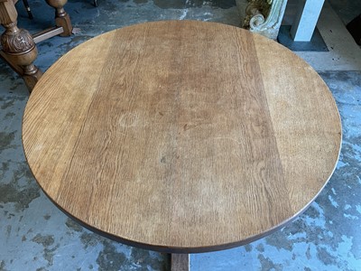 Lot 1513 - Robert 'Mouseman' Thompson oak breakfast table, with circular adzed top on quatreform pedestal base, 107cm diameter x 74cm high
