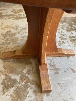 Lot 1513 - Robert 'Mouseman' Thompson oak breakfast table, with circular adzed top on quatreform pedestal base, 107cm diameter x 74cm high