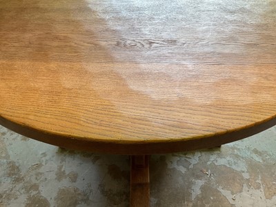 Lot 1513 - Robert 'Mouseman' Thompson oak breakfast table, with circular adzed top on quatreform pedestal base, 107cm diameter x 74cm high