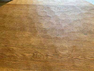 Lot 1513 - Robert 'Mouseman' Thompson oak breakfast table, with circular adzed top on quatreform pedestal base, 107cm diameter x 74cm high