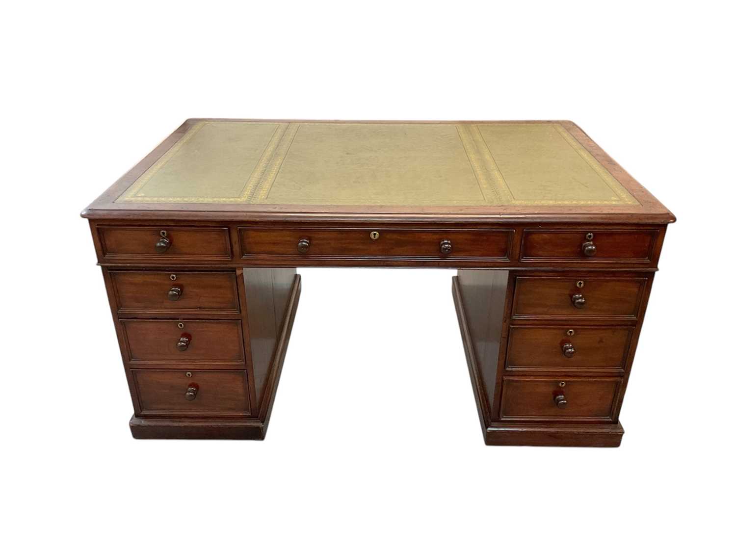 Lot 1512 - Early Victorian mahogany partners desk, with leather inset top and nine drawers to the kneehole with three drawers and twin cupboards to opposing kneehole, on plinth bases, 152cm wide x 99cm dee...