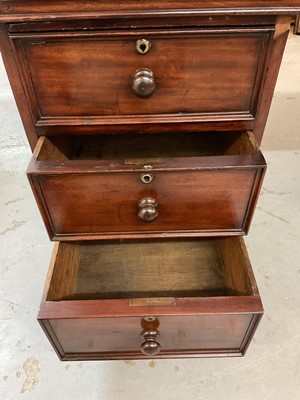 Lot 1512 - Early Victorian mahogany partners desk, with leather inset top and nine drawers to the kneehole with three drawers and twin cupboards to opposing kneehole, on plinth bases, 152cm wide x 99cm dee...