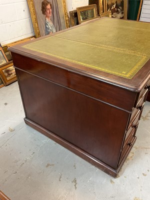 Lot 1512 - Early Victorian mahogany partners desk, with leather inset top and nine drawers to the kneehole with three drawers and twin cupboards to opposing kneehole, on plinth bases, 152cm wide x 99cm dee...