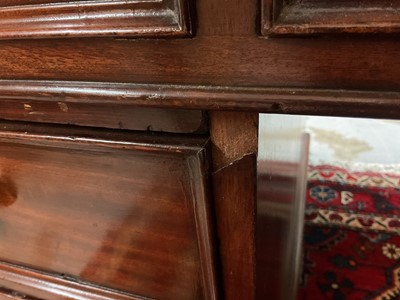 Lot 1512 - Early Victorian mahogany partners desk, with leather inset top and nine drawers to the kneehole with three drawers and twin cupboards to opposing kneehole, on plinth bases, 152cm wide x 99cm dee...