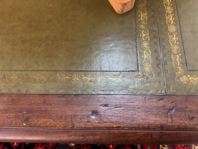 Lot 1512 - Early Victorian mahogany partners desk, with leather inset top and nine drawers to the kneehole with three drawers and twin cupboards to opposing kneehole, on plinth bases, 152cm wide x 99cm dee...