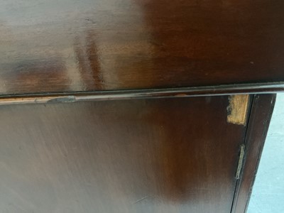 Lot 1512 - Early Victorian mahogany partners desk, with leather inset top and nine drawers to the kneehole with three drawers and twin cupboards to opposing kneehole, on plinth bases, 152cm wide x 99cm dee...