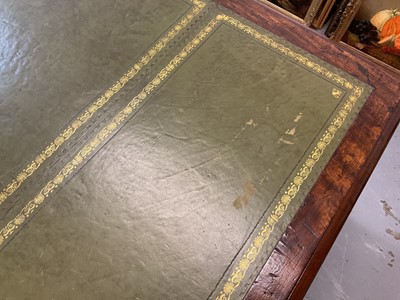 Lot 1512 - Early Victorian mahogany partners desk, with leather inset top and nine drawers to the kneehole with three drawers and twin cupboards to opposing kneehole, on plinth bases, 152cm wide x 99cm dee...