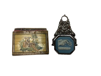 Lot 99 - Georgian cut steel fob with inset blue Jasper ware plaque depicting a classical scene and early 19th century straw work miniature book containg a pack of miniature playing cards by G.L.Wust, Fra...