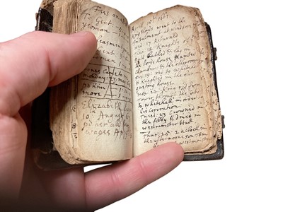 Lot 70 - 17th century Goldsmith's pocket Almanack dated 1658, in original tooled leather binding, a fascinating printed and handwritten account of the daily life of the owner ( apparently un-named) It men...