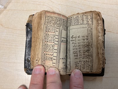 Lot 70 - 17th century Goldsmith's pocket Almanack dated 1658, in original tooled leather binding, a fascinating printed and handwritten account of the daily life of the owner ( apparently un-named) It men...