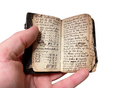 Lot 70 - 17th century Goldsmith's pocket Almanack dated 1658, in original tooled leather binding, a fascinating printed and handwritten account of the daily life of the owner ( apparently un-named) It men...