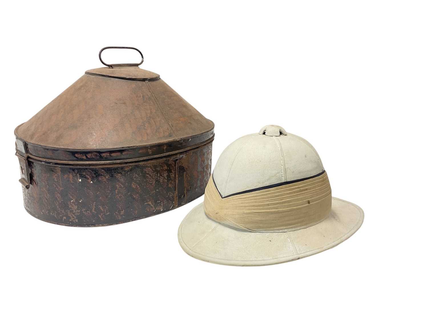 Lot 112 - Early 20th century British Officer's Wolseley pattern pith helmet with original silk and leather lining, in a japanned helmet tin.