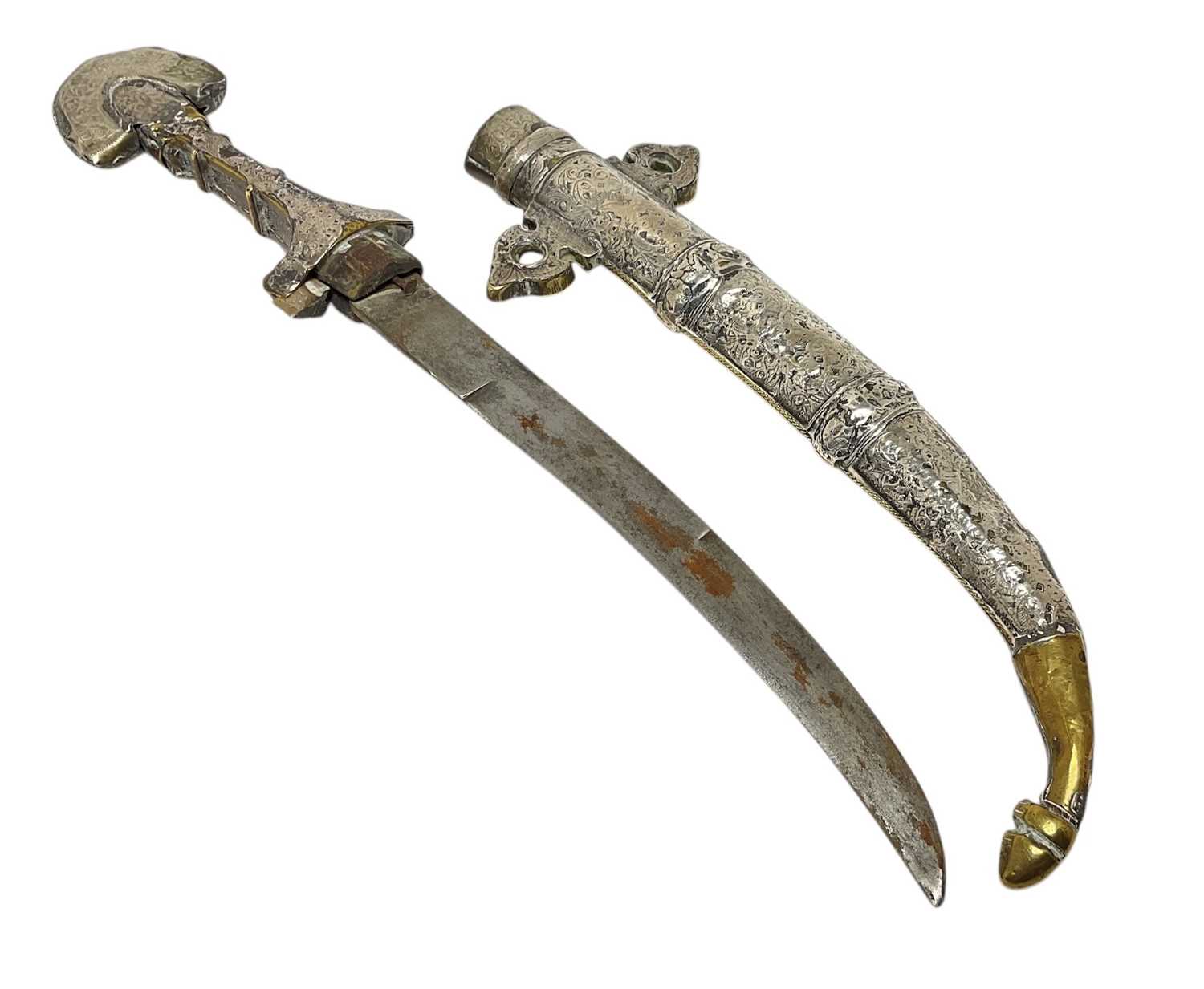 Lot 139 - Early 20th century Indo Persian Khanjar dagger, with white covered metal scabbard and grip and curved steel blade, blade 23.5cm in length.