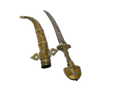 Lot 139 - Early 20th century Indo Persian Khanjar dagger, with white covered metal scabbard and grip and curved steel blade, blade 23.5cm in length.