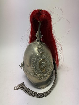 Lot 109 - Victorian 1871 Pattern Yorkshire Dragoons trumpeters helmet with white metal skull with ornate bi-metal helmet plate, original chinchains and leather liner, red horse hair plume (denoting for th...