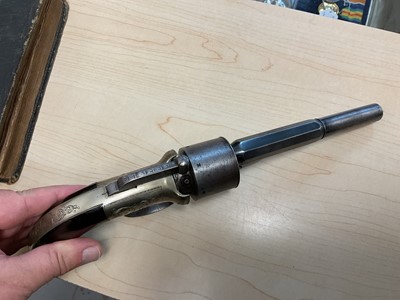 Lot 150 - Good quality Victorian percussion Transitional revolver with engraved German Silver frame with walnut grips, six shot cylinder, two stage barrel retaining much original blue finish. In original...