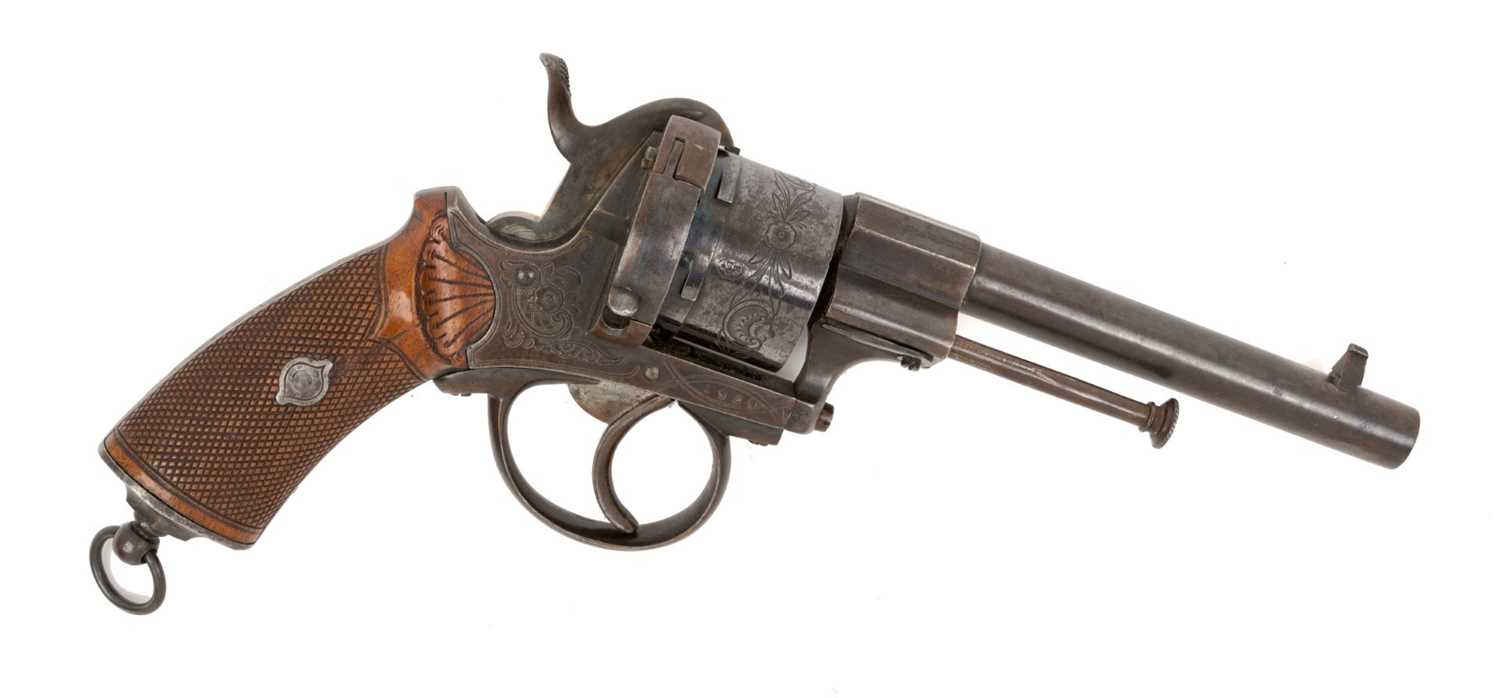 Lot 152 - Good quality French Pinfire Officer's revolver circa 1860 with floral engraved steel frame and six shot cylinder retaining much original finish, ornate carved and chequered walnut grips with stee...