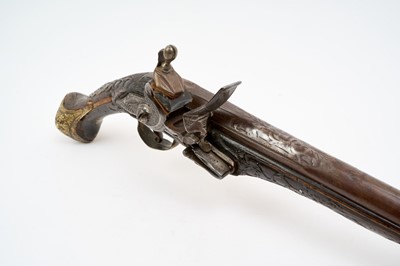 Lot 157 - 19th century Balkan/ Turkish flintlock holster pistol with ornate brass and steel mounts, carved walnut and silver wire inlaid stock 50cm overall