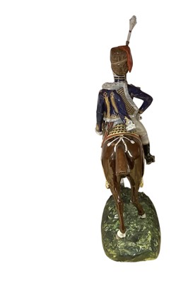 Lot 133 - Good quality Dresden porcelain military equestrian figure of a mounted Napoleonic period British Hussar Officer on naturalistic base, marked underneath ' 1815 10th Hussars' and 'Made in Dr...