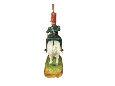 Lot 134 - Good quality Dresden porcelain military equestrian figure of French Napoleonic Cavalry Officer on naturalistic base, marked underneath' Majeur des Eclaireurs' and ' Made in Dresden' 38cm