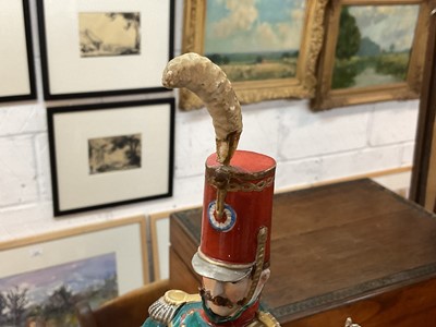 Lot 134 - Good quality Dresden porcelain military equestrian figure of French Napoleonic Cavalry Officer on naturalistic base, marked underneath' Majeur des Eclaireurs' and ' Made in Dresden' 38cm