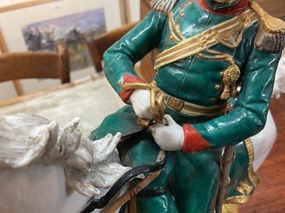 Lot 134 - Good quality Dresden porcelain military equestrian figure of French Napoleonic Cavalry Officer on naturalistic base, marked underneath' Majeur des Eclaireurs' and ' Made in Dresden' 38cm