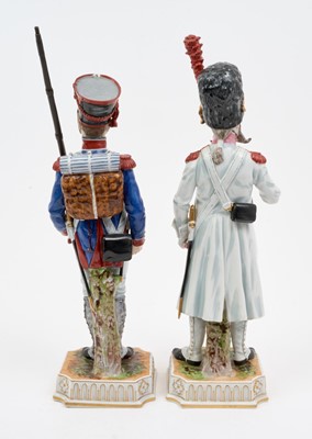 Lot 135 - Pair good quality Naples Porcelain military figures depicting a French Napoleonic infantryman with metal musket and a similar Pioneer , approx 30cm high