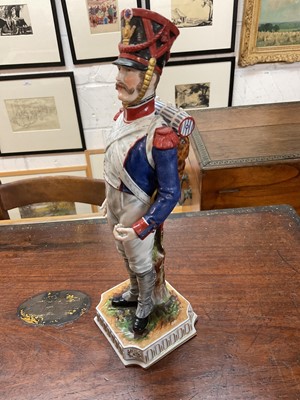 Lot 135 - Pair good quality Naples Porcelain military figures depicting a French Napoleonic infantryman with metal musket and a similar Pioneer , approx 30cm high