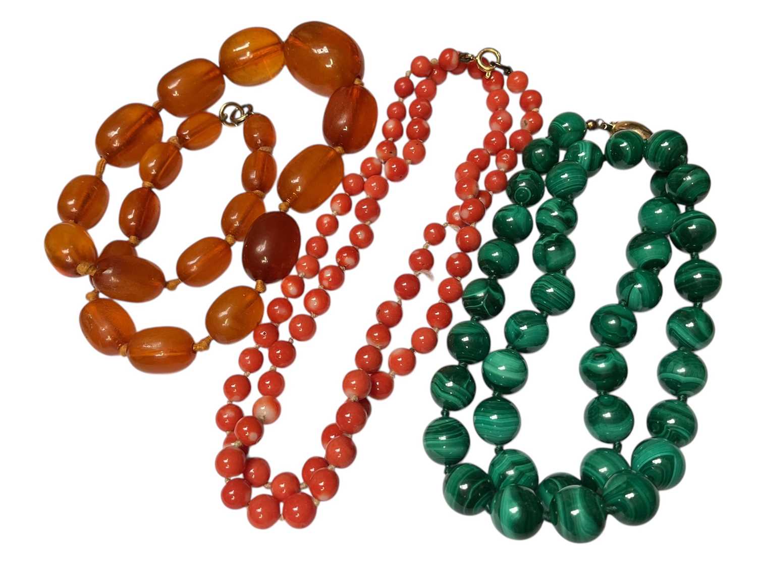 Lot 40 - Vintage amber bead necklace, vintage coral bead necklace and a malachite bead necklace