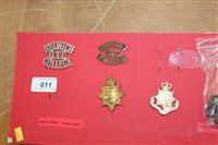 Lot 611 - Collection O.T.C. badges and shoulder titles...